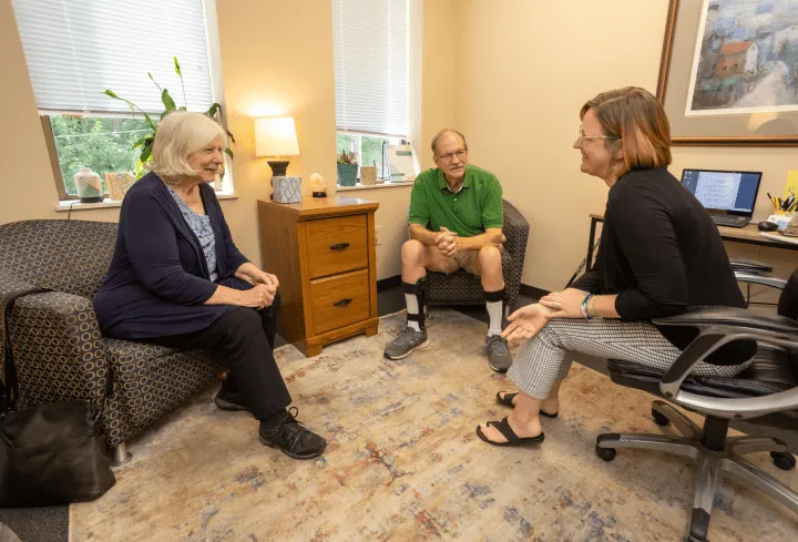 Therapist consulting with patient